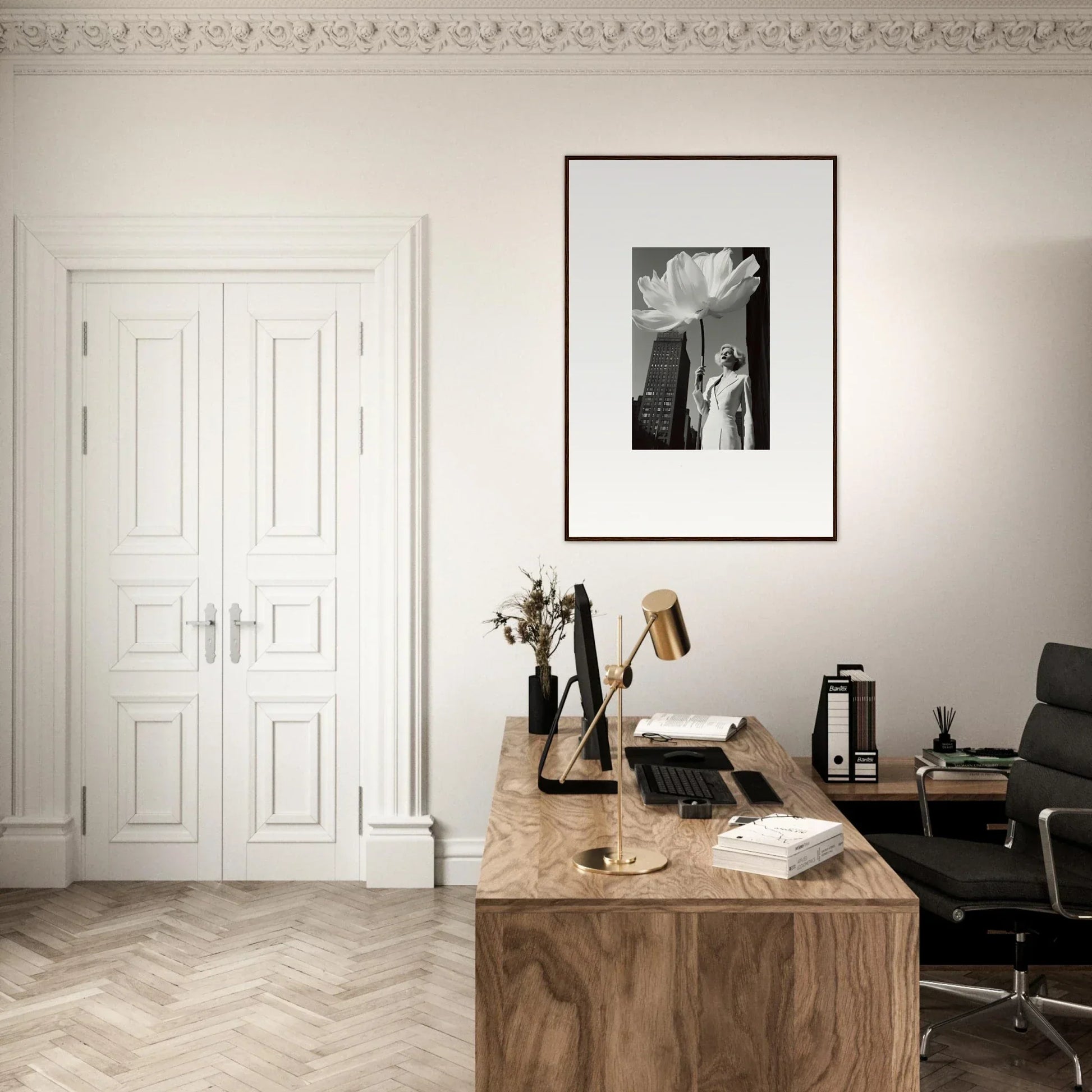 Wooden desk with various office items on its surface.