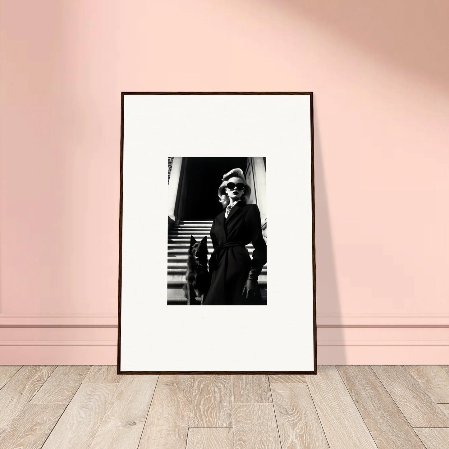 Framed black and white wall art of a person on stairs, perfect for room decoration