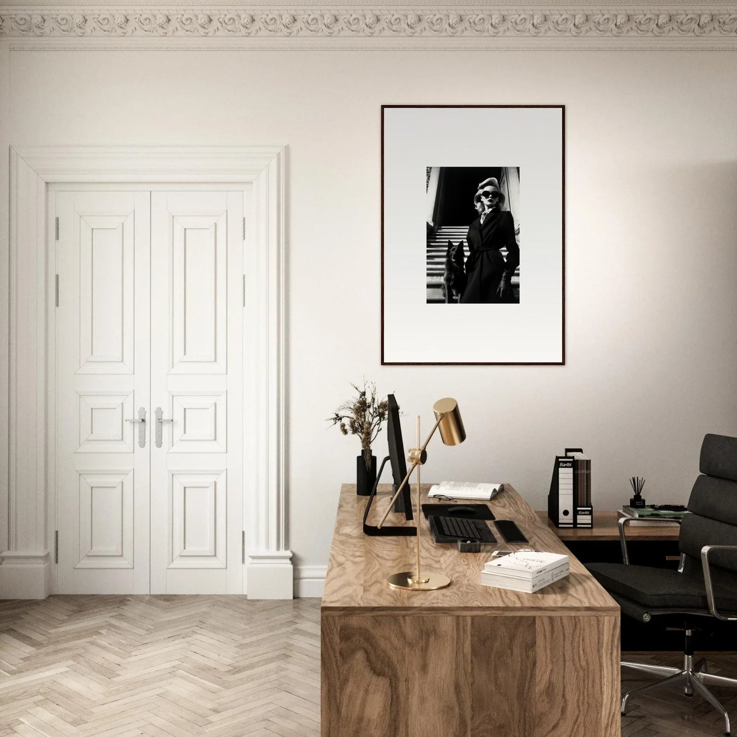 Elegant home office with wall art, featuring a wooden desk and vintage typewriter