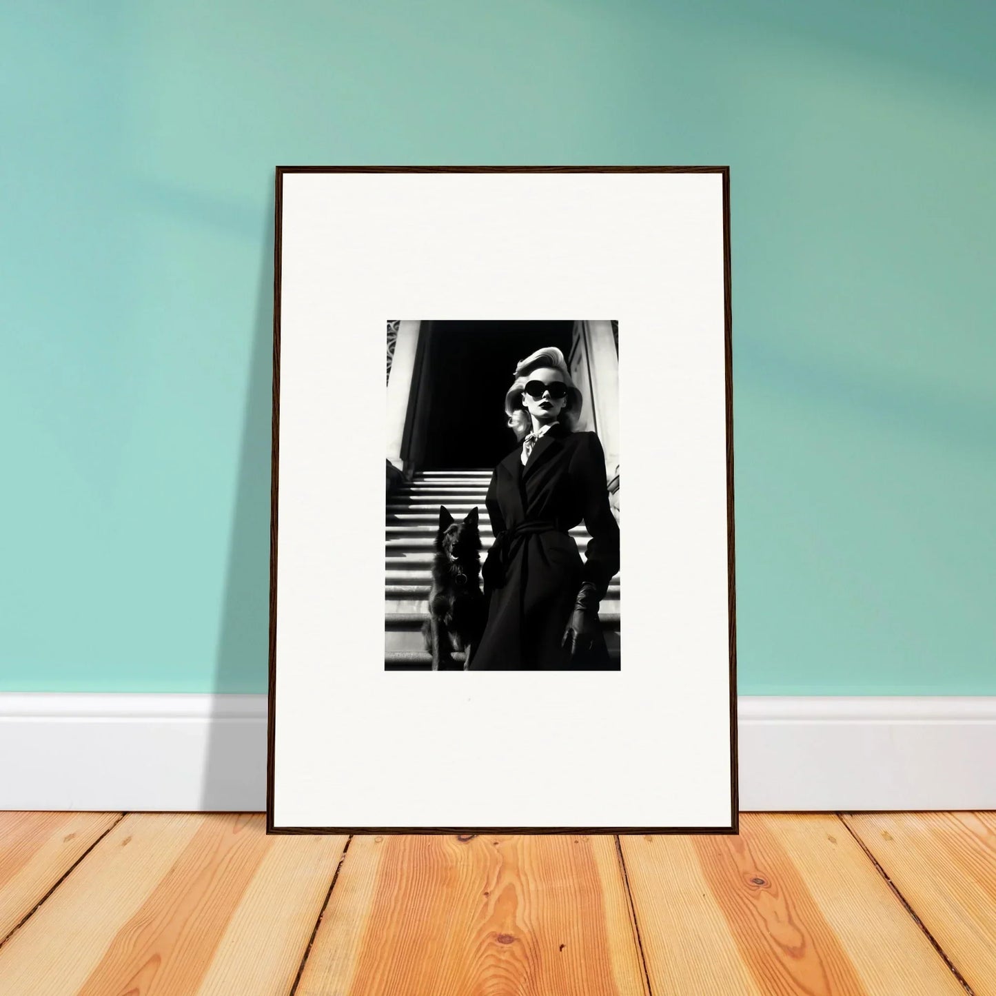 Framed black and white wall art of a person on stairs, perfect for room decoration