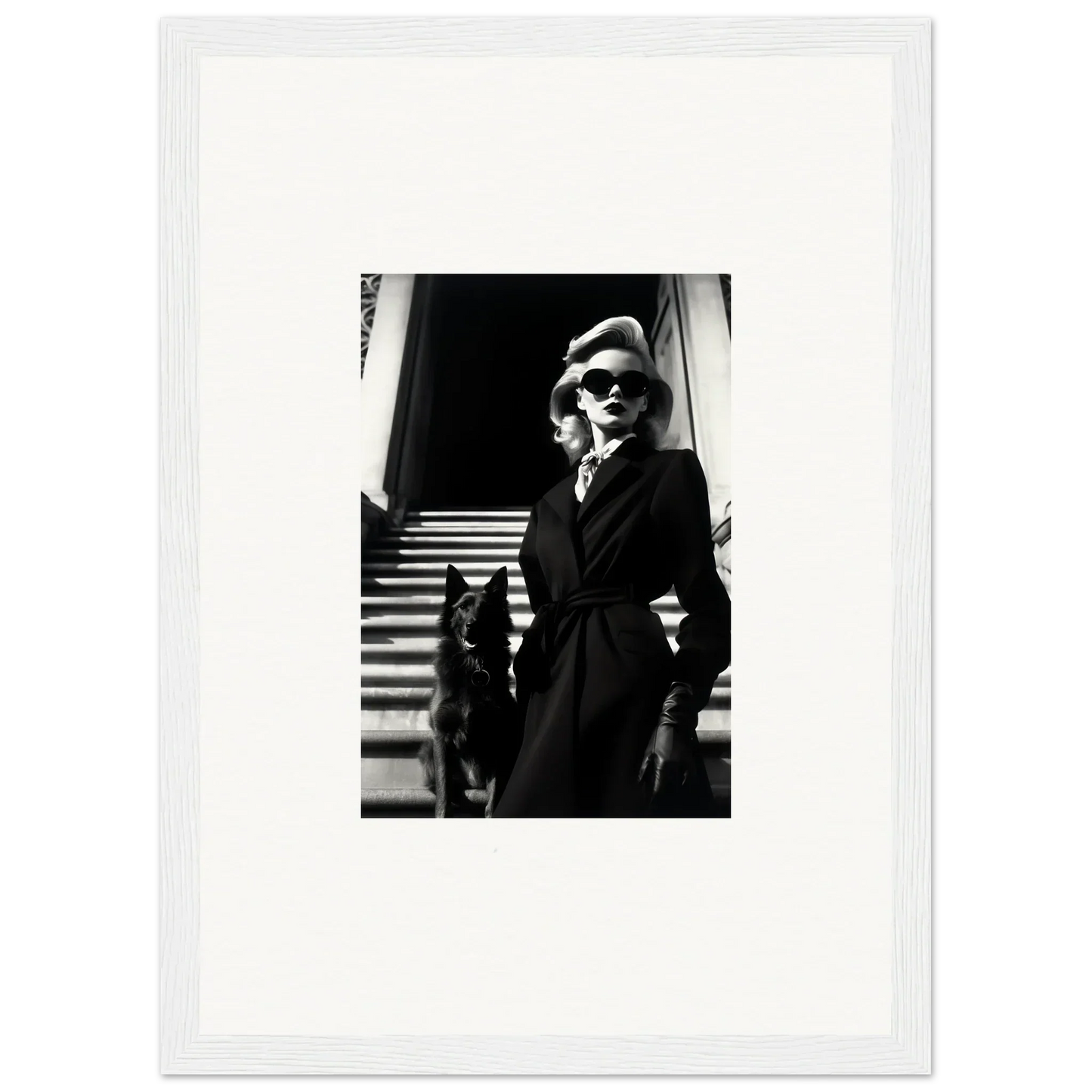 Black and white wall art of a woman in a coat with a dog on stairs, perfect for room decoration