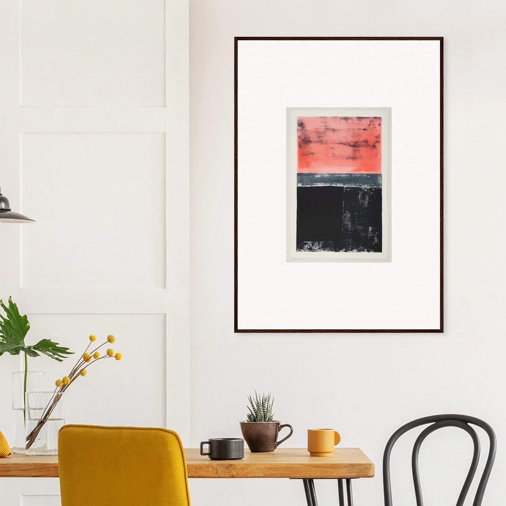 Framed abstract artwork with red and black color blocks for modern room decor