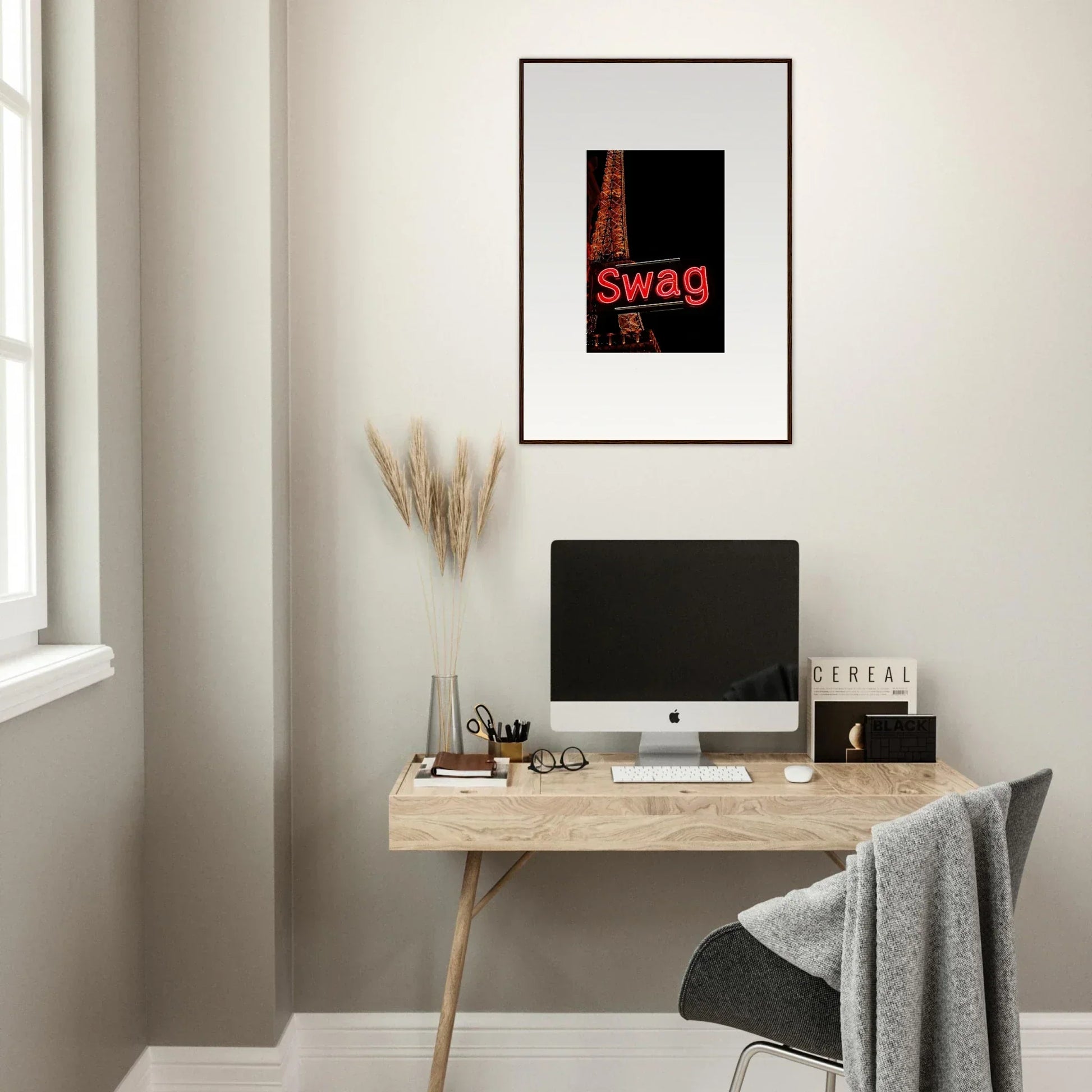 Minimalist home office with a desk, monitor, and Urban Dreams Unleashed canvas print