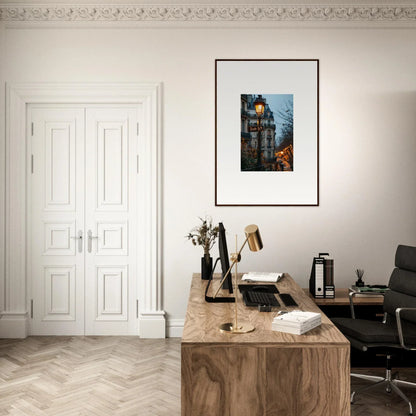 Home office workspace with wooden desk, chair, and twilight serenade framed wall art