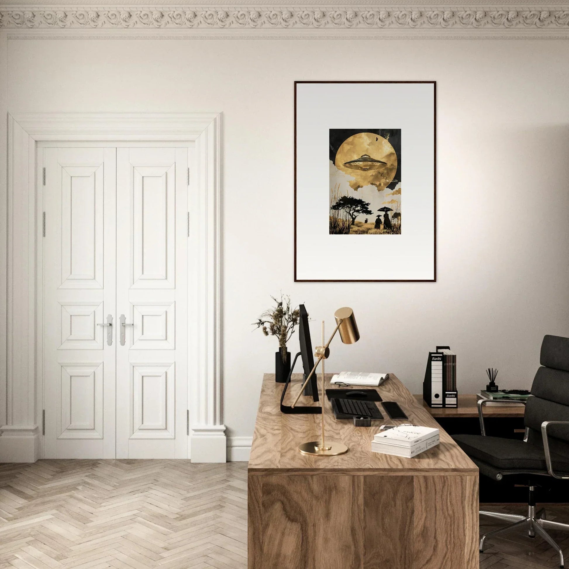 Home office workspace featuring a wooden desk and golden serenade framed wall art