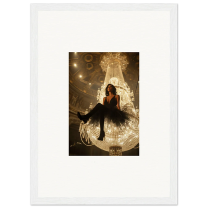 Woman in a black dress on a giant illuminated chandelier for Velvet Charset Angel room decoration