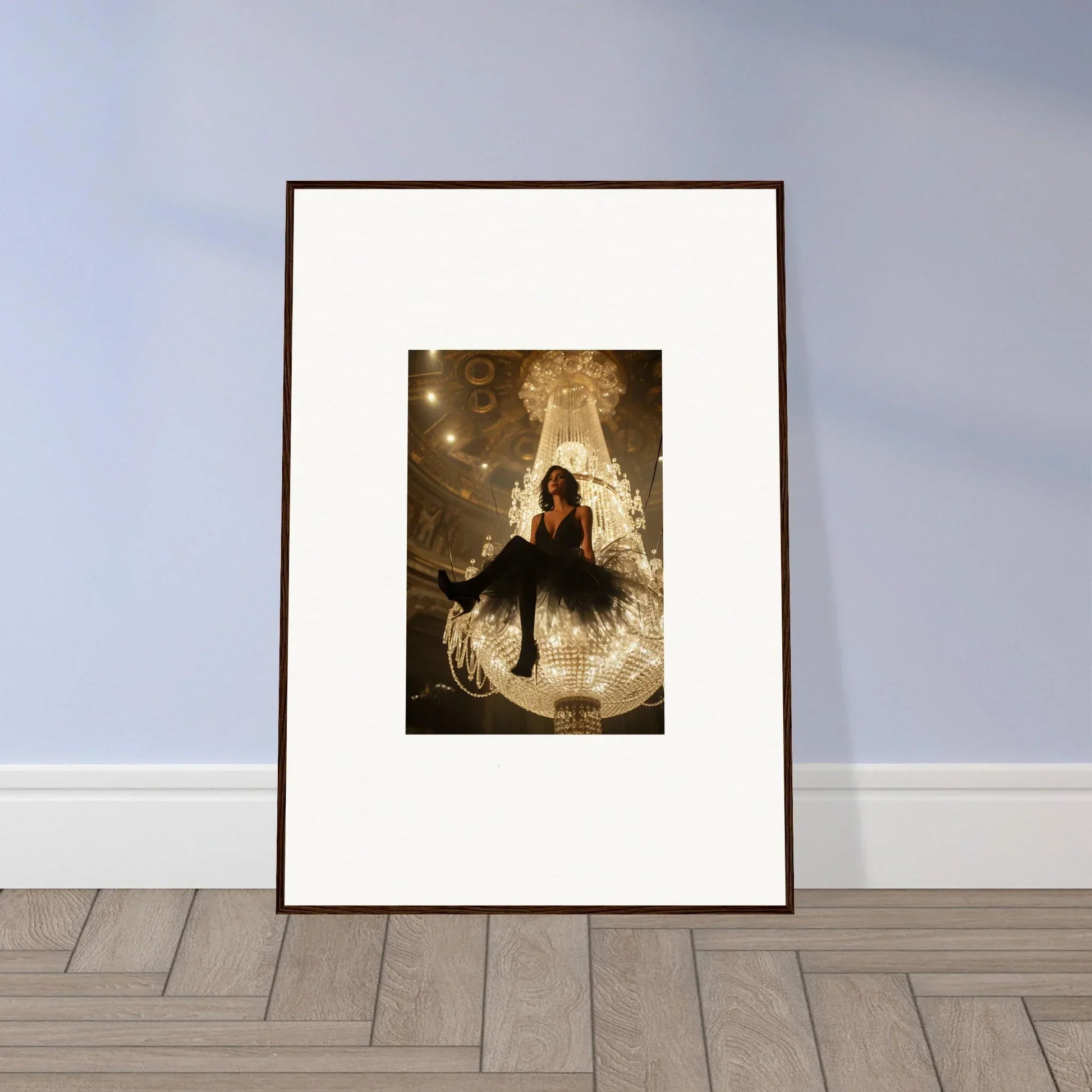 Framed Velvet Charset Angel canvas print with a silhouetted figure on a glowing chandelier