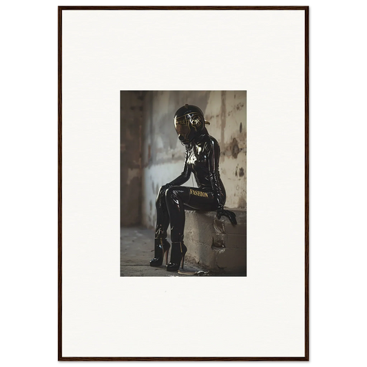 Framed photograph of a person sitting, covered in a shiny dark substance.