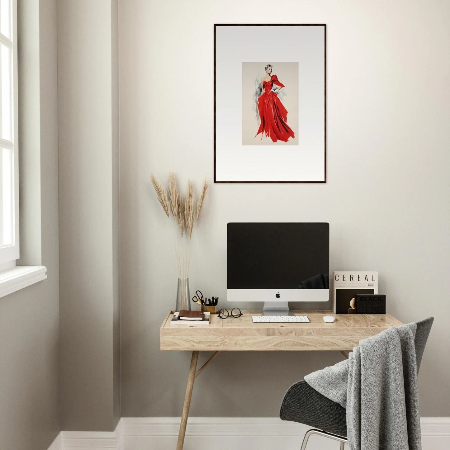 Simple wooden desk with iMac and Velvet Mirage framed art above it