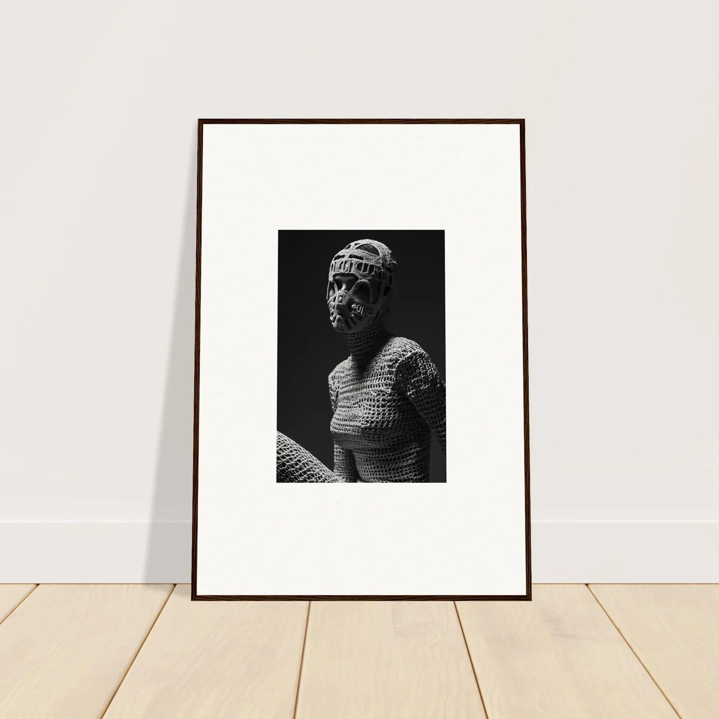 Framed black and white photograph of a classical-style bust sculpture.