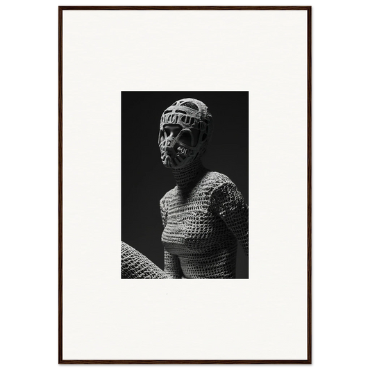 Black and white photograph of a figure wearing a knitted or crocheted bodysuit and headpiece.