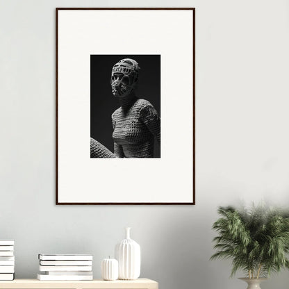 Framed black and white photograph of an ancient bust sculpture with intricate details.