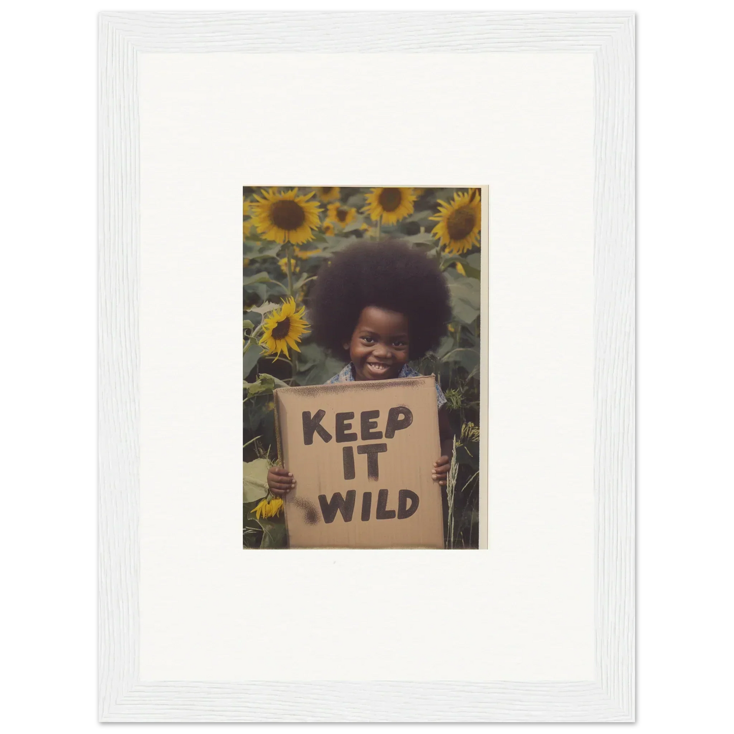 Cardboard sign saying keep it wild, part of Visions Bloom Exuberance collection