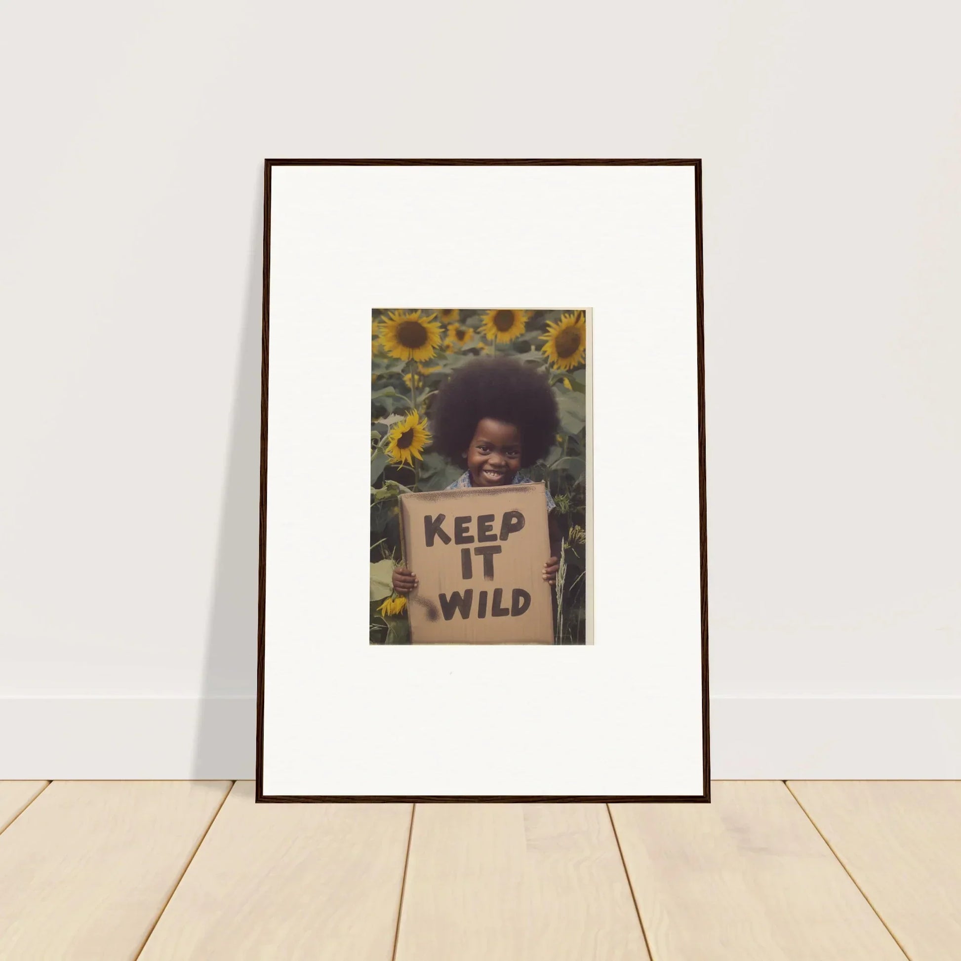 Framed artwork of Keep It Wild surrounded by sunflowers in Visions Bloom Exuberance