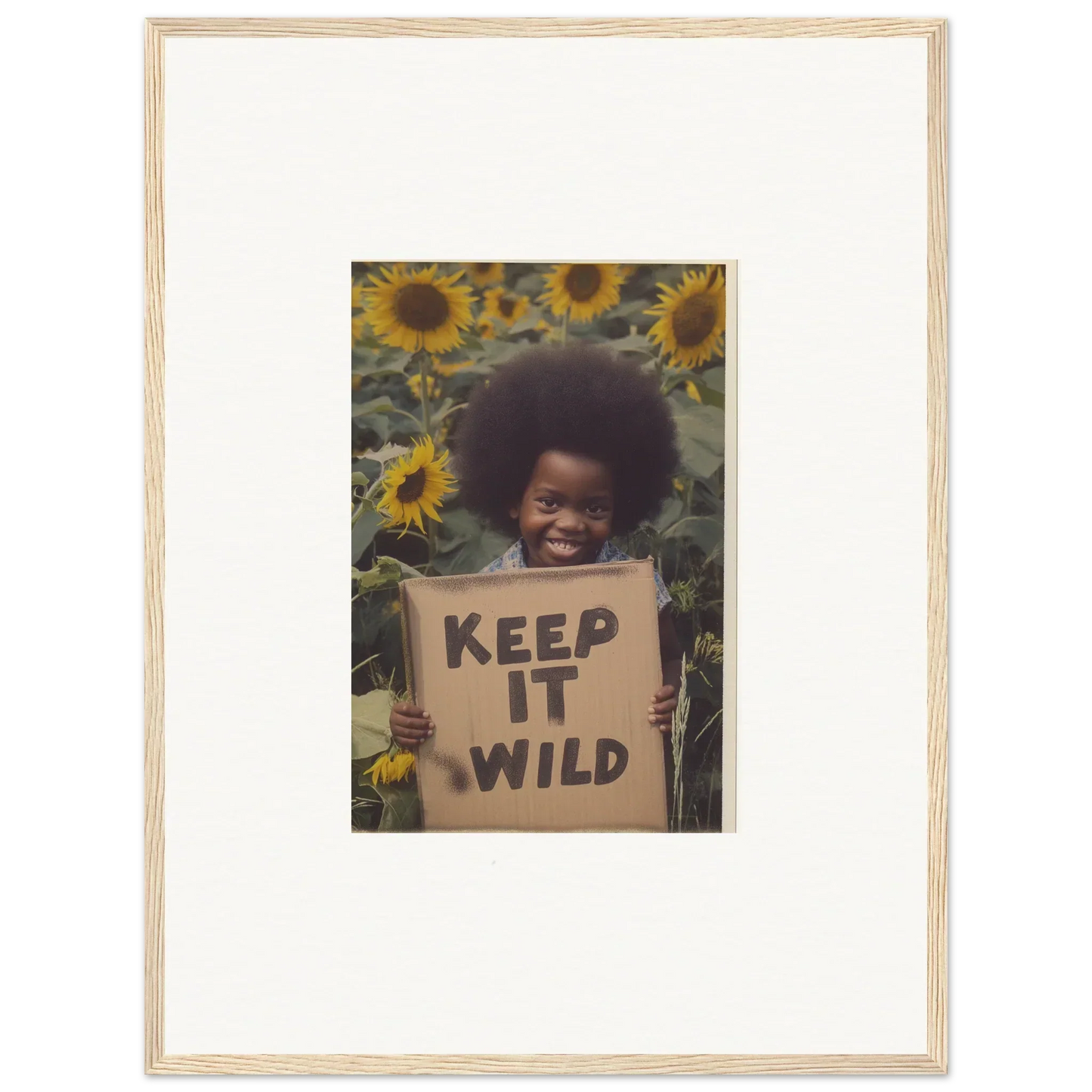 Framed art of Keep It Wild sign against sunflowers from Visions Bloom Exuberance