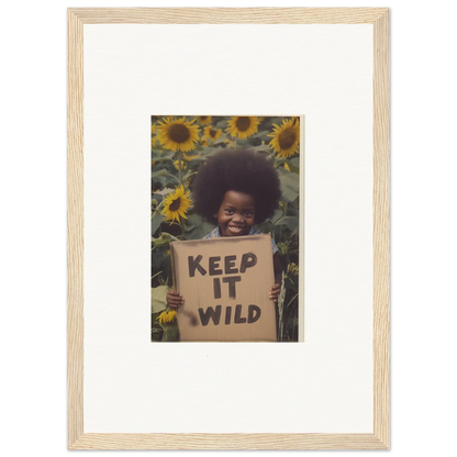 Framed photo of KEEP IT WILD sign surrounded by sunflowers from Visions Bloom Exuberance