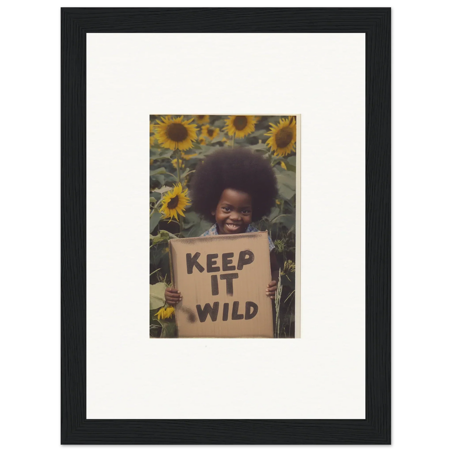 Framed photo of KEEP IT WILD sign among sunflowers in Visions Bloom Exuberance art