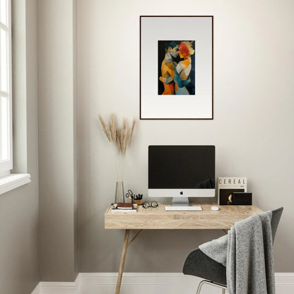 Minimalist home office with wooden desk, computer, and ethereal whispers wall art