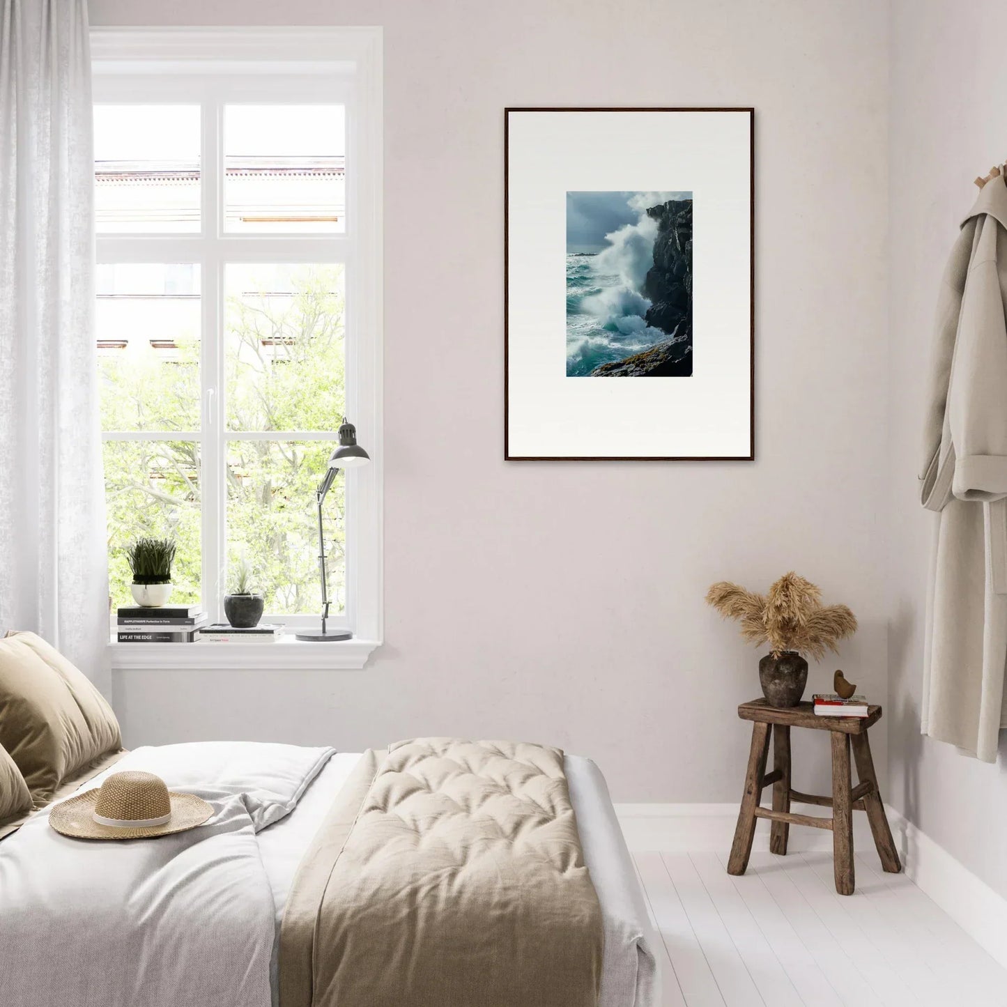 Framed photograph of ocean waves crashing on cliffs, perfect for echoed thoughts in room decoration