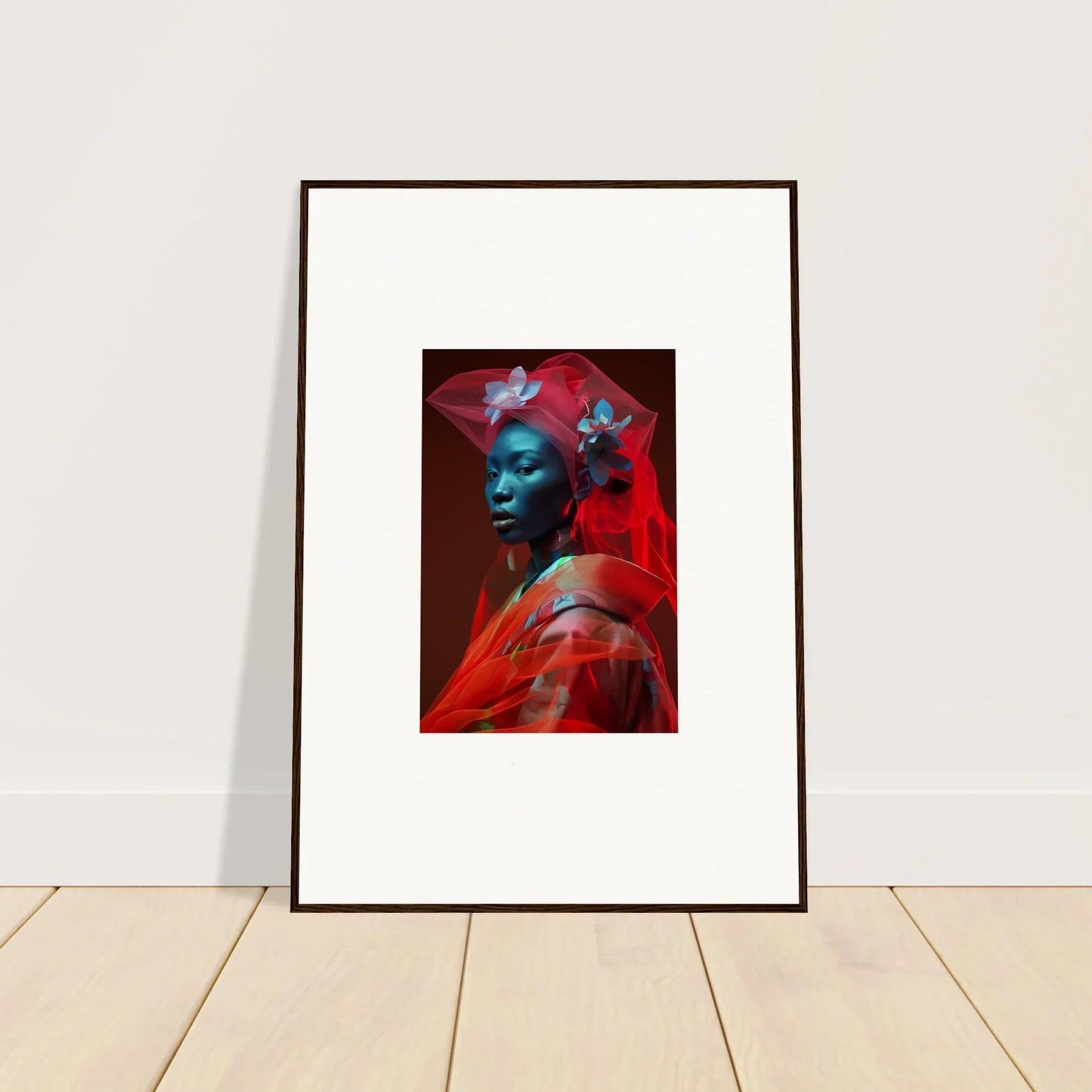 Framed canvas print of a vibrant red and blue portrait for room decoration with velvet botanicals