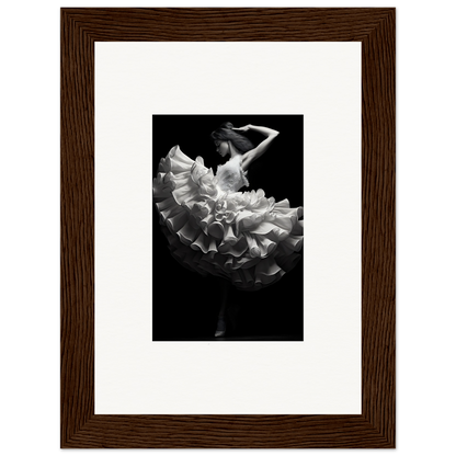 Framed black and white photograph of a dancer in a flowing ruffled dress.