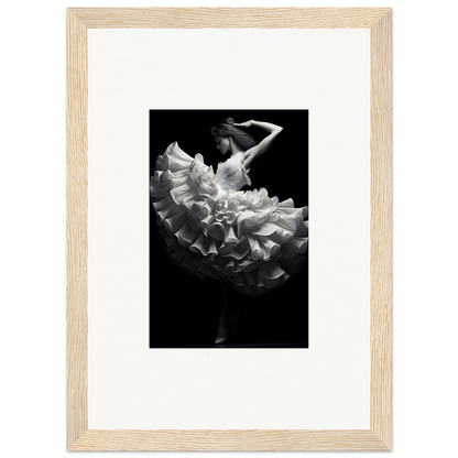 Black and white photograph of a dancer in a flowing, ruffled dress captured mid-movement.