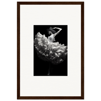 Black and white photograph of a dancer in a flowing, ruffled dress.