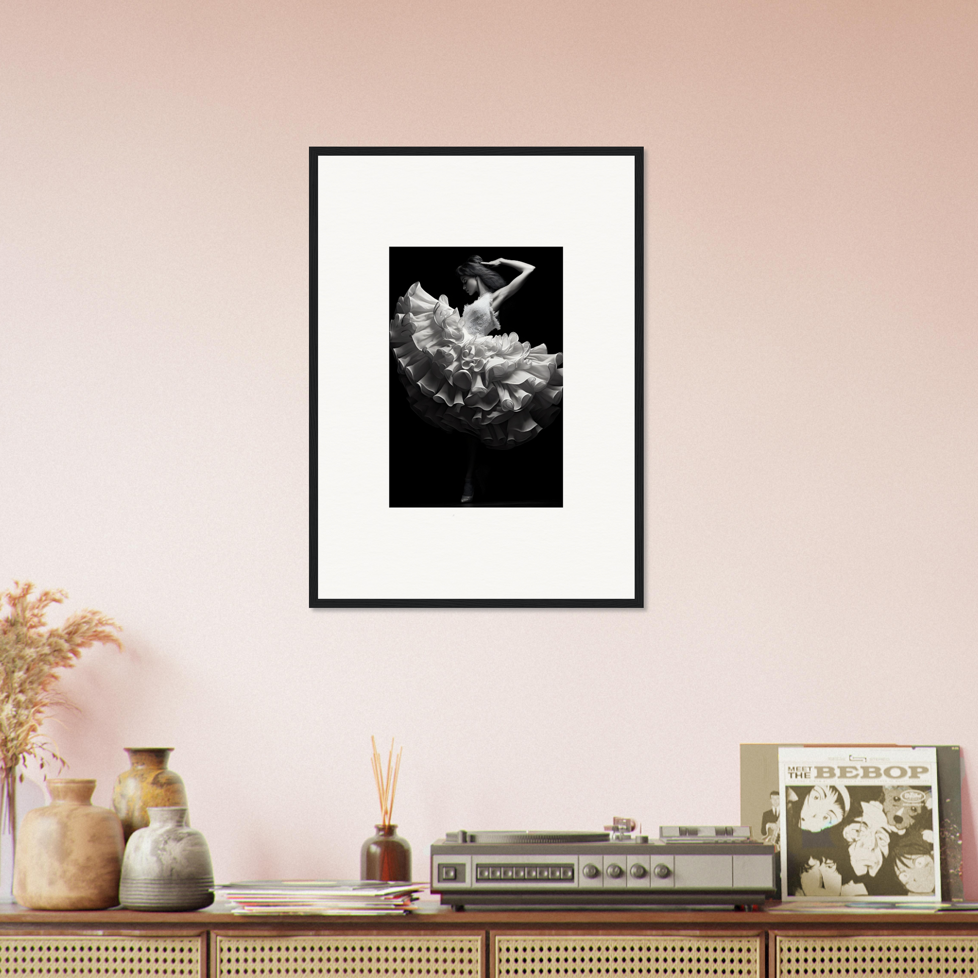 Framed black and white photograph of a dancer in a flowing dress.