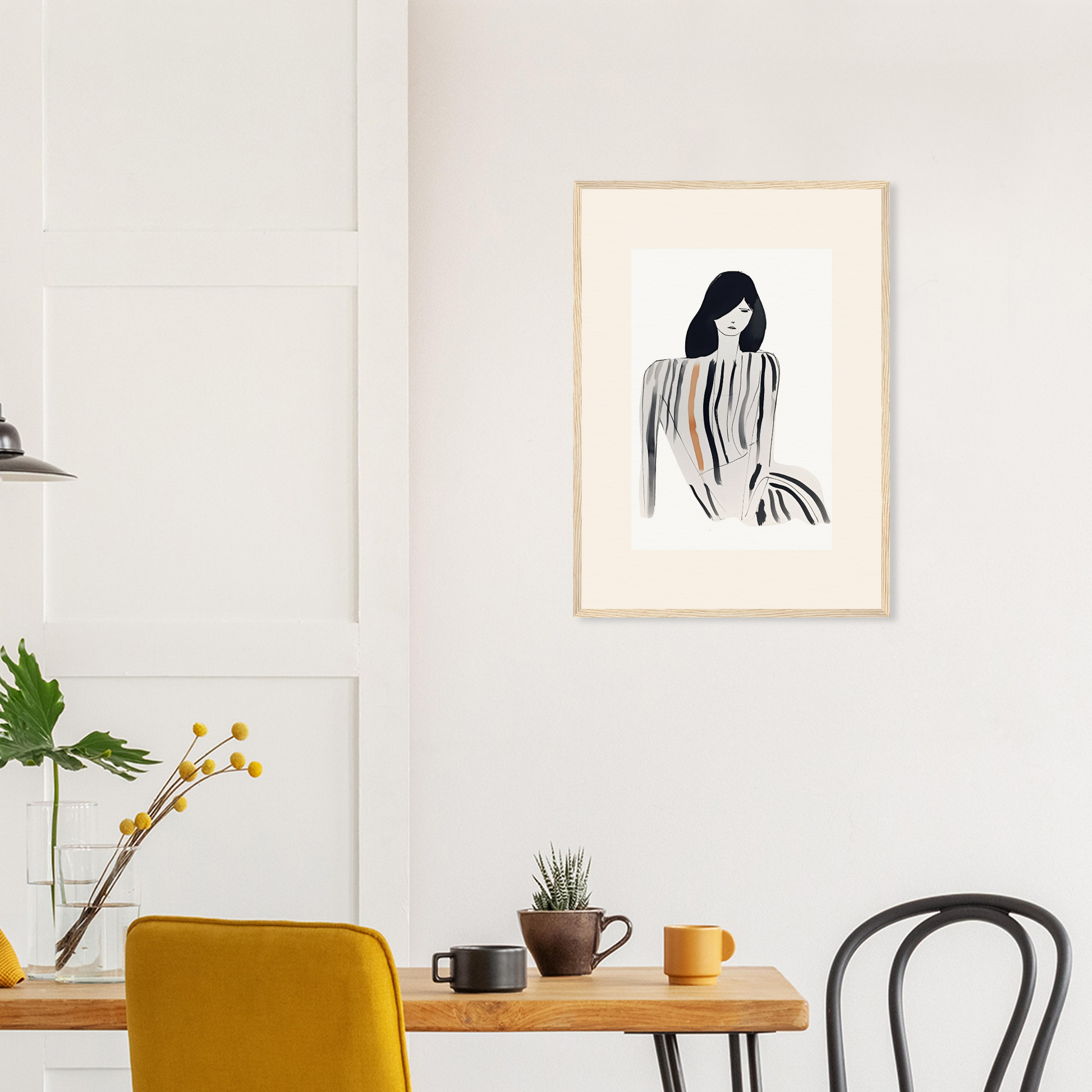 Framed minimalist sketch of a woman with long dark hair and striped clothing.