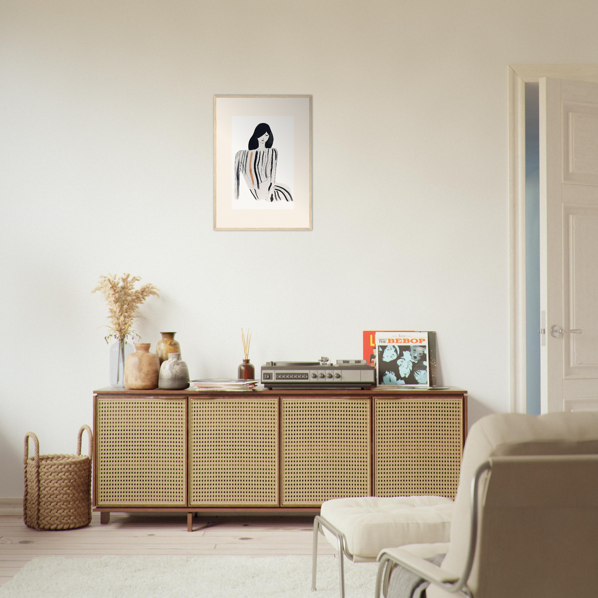 Wooden sideboard with cane-webbed doors and decorative items on top.