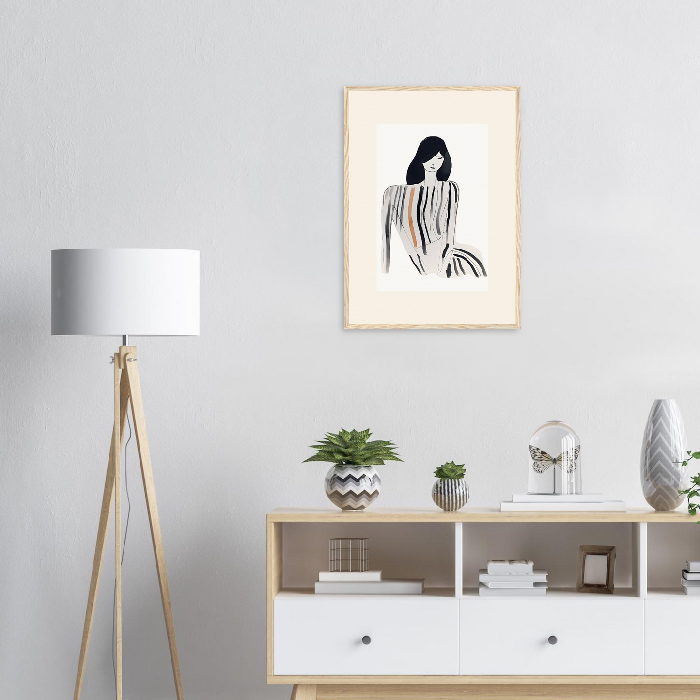 Framed minimalist sketch of a woman with long, flowing hair.