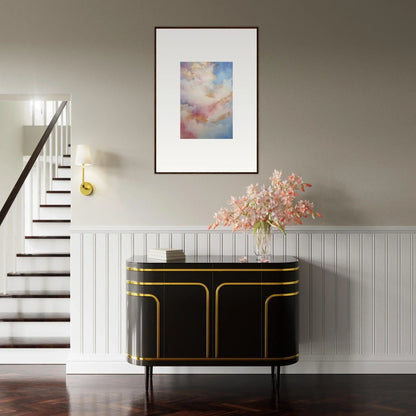 Art deco-style black cabinet with gold trim, perfect for showcasing framed wall art