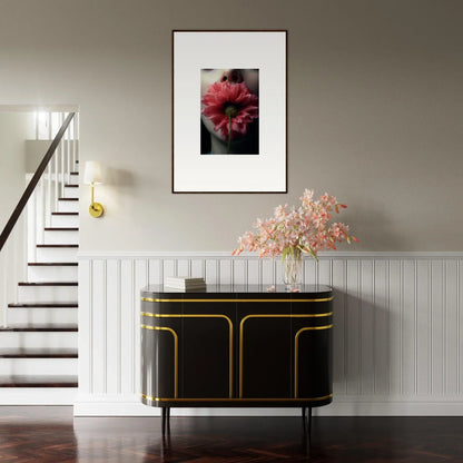 Elegant black and gold sideboard under a Whispers Bloom Eternally canvas print for chic room decoration