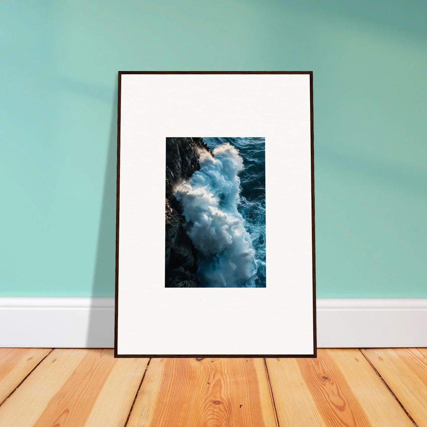 Framed wall art of crashing ocean waves on rocky cliffs, perfect for room decor