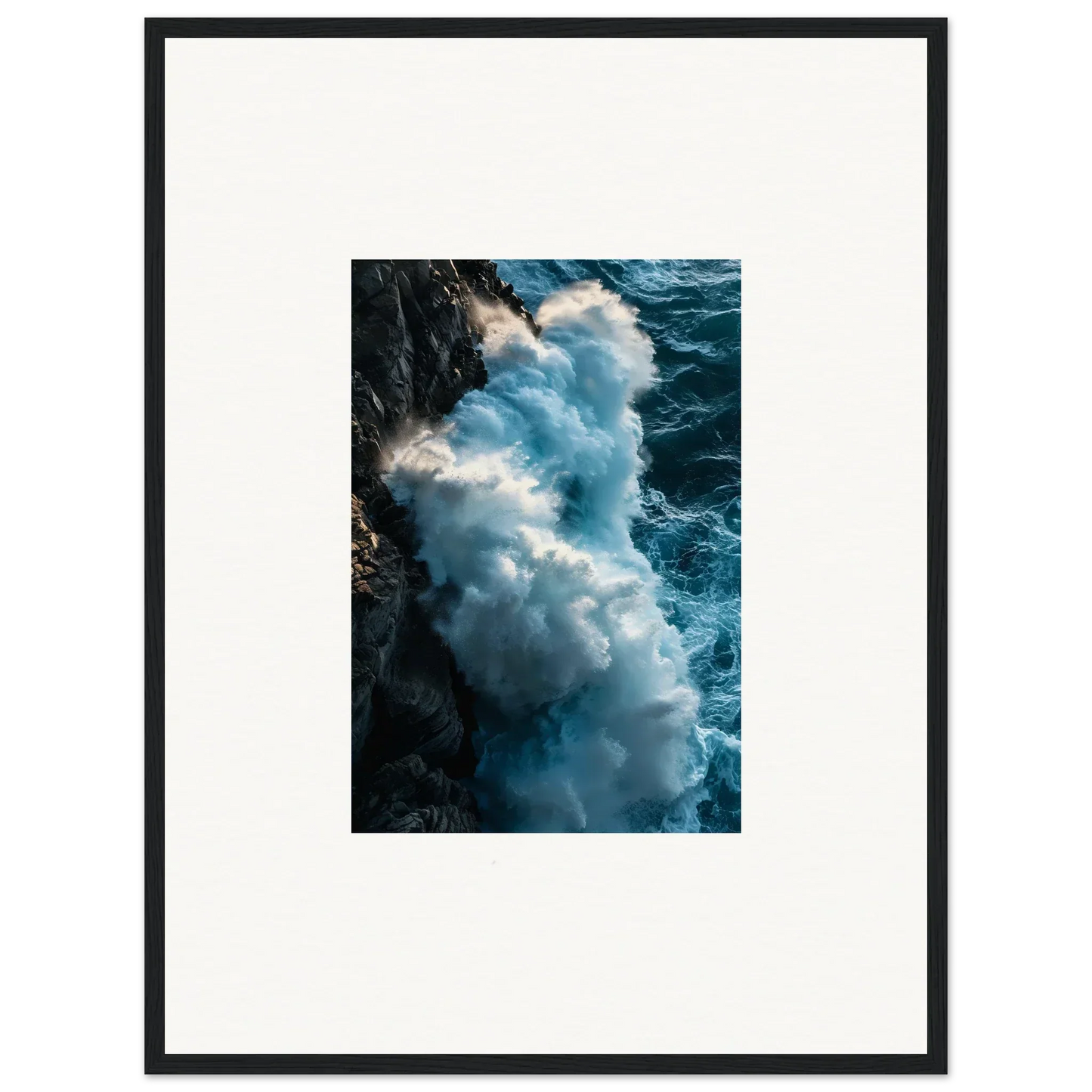 Powerful ocean wave crashing against rocky cliff in framed wall art for room decor