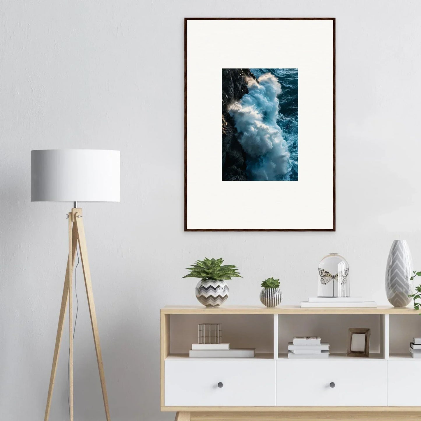 Framed wall art featuring a crashing ocean wave with blue-white foam for stunning room decor