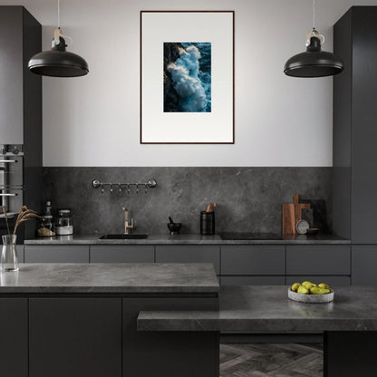 Modern kitchen with dark gray cabinetry and framed cloud photograph wall art