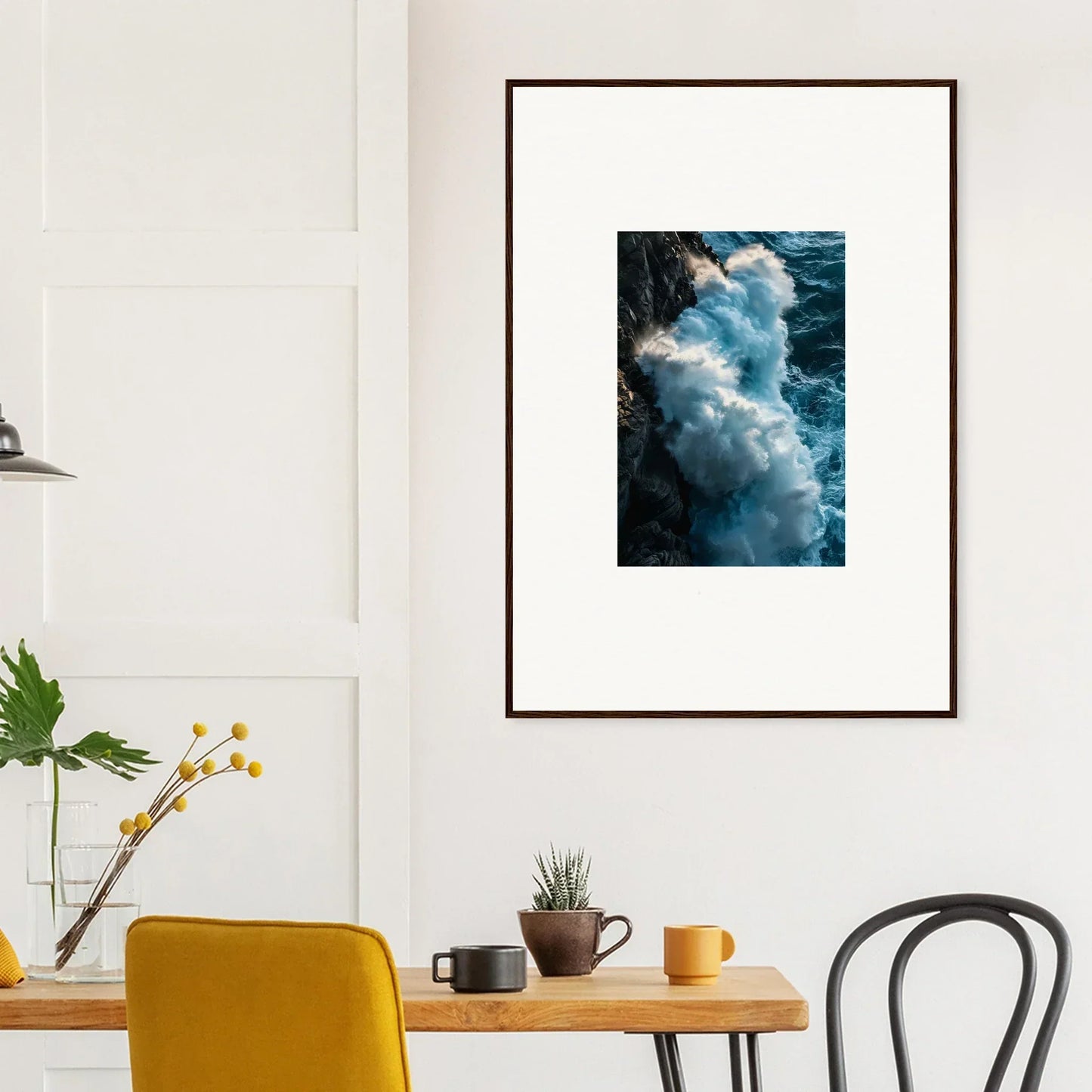 Framed wall art of crashing ocean waves adds elegance to your room decor