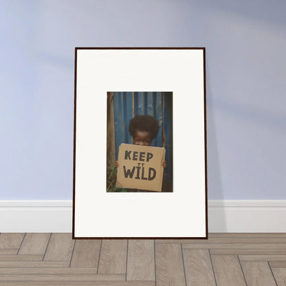 Framed canvas print of a figure with a KEEP WILD sign for room decoration in Innocent Harmony