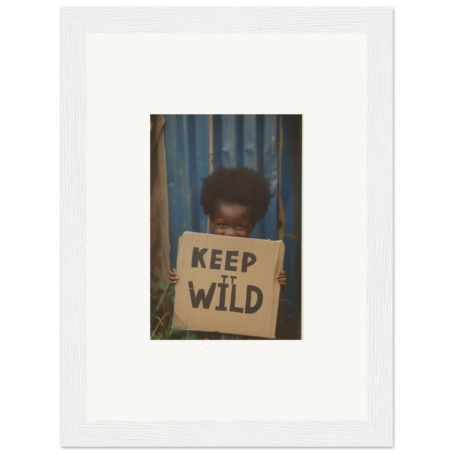 Framed photo of a person with a KEEP IT WILD sign, perfect for room decoration in Innocent Harmony style