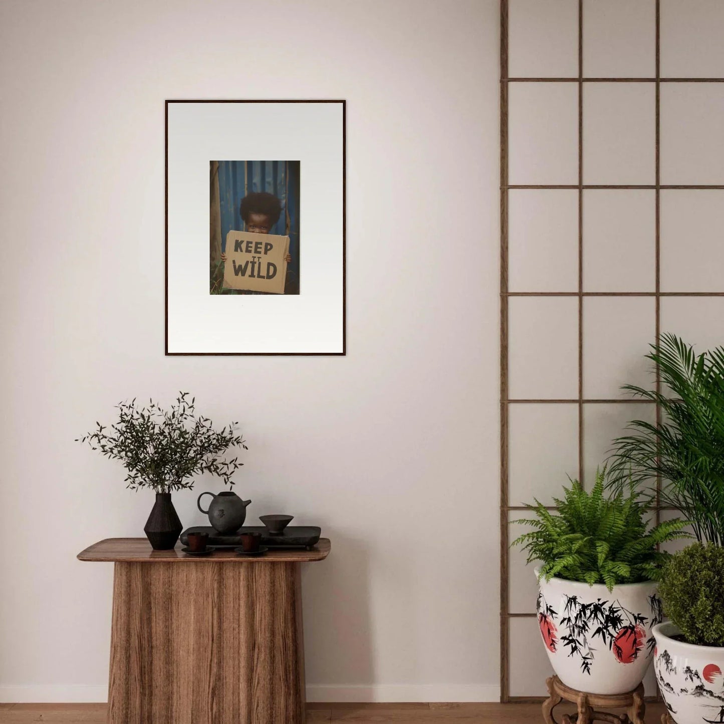 Framed canvas print with KEEP IT WILD text for unique room decoration in innocent harmony