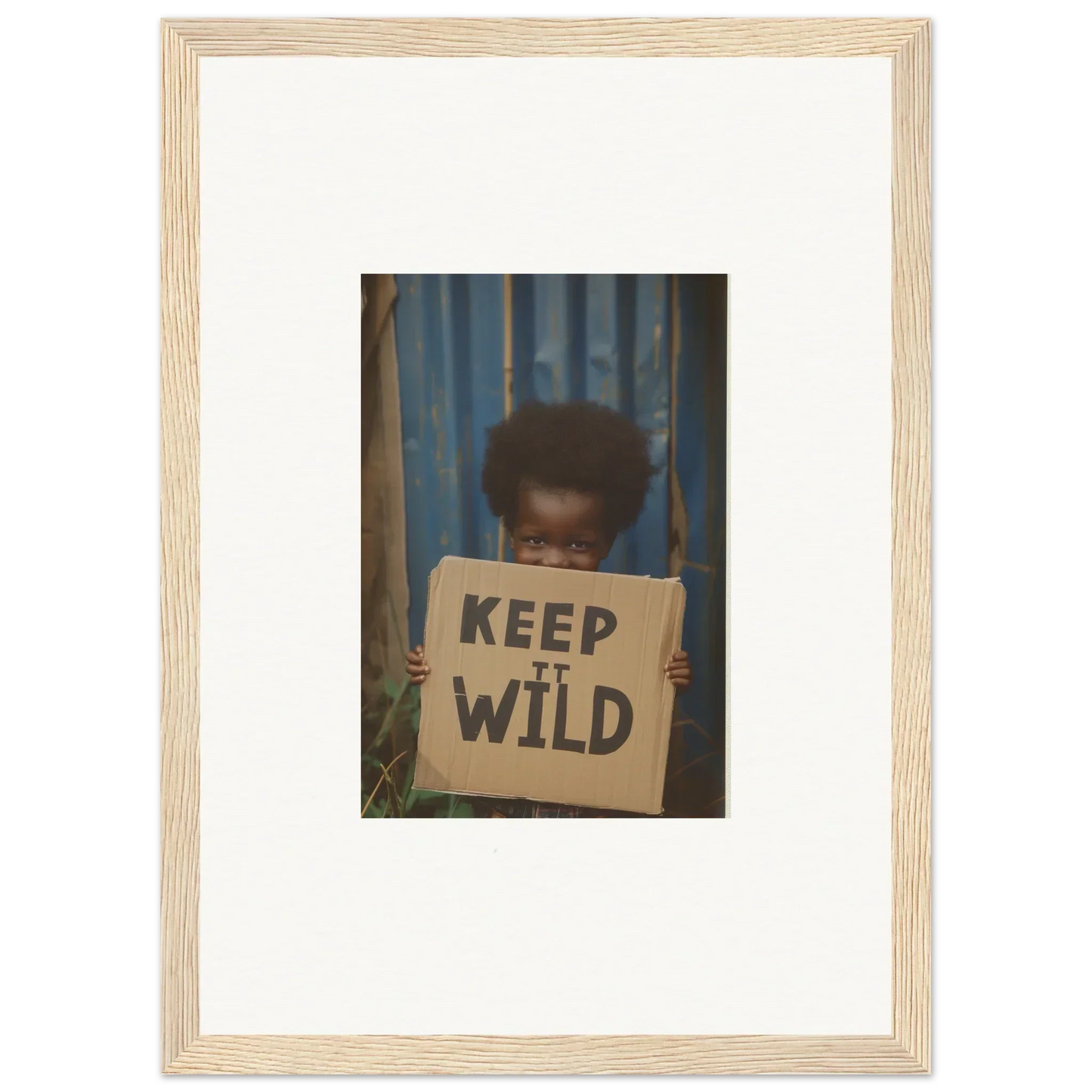 Framed photograph showing KEEP IT WILD sign for innocent harmony room decoration