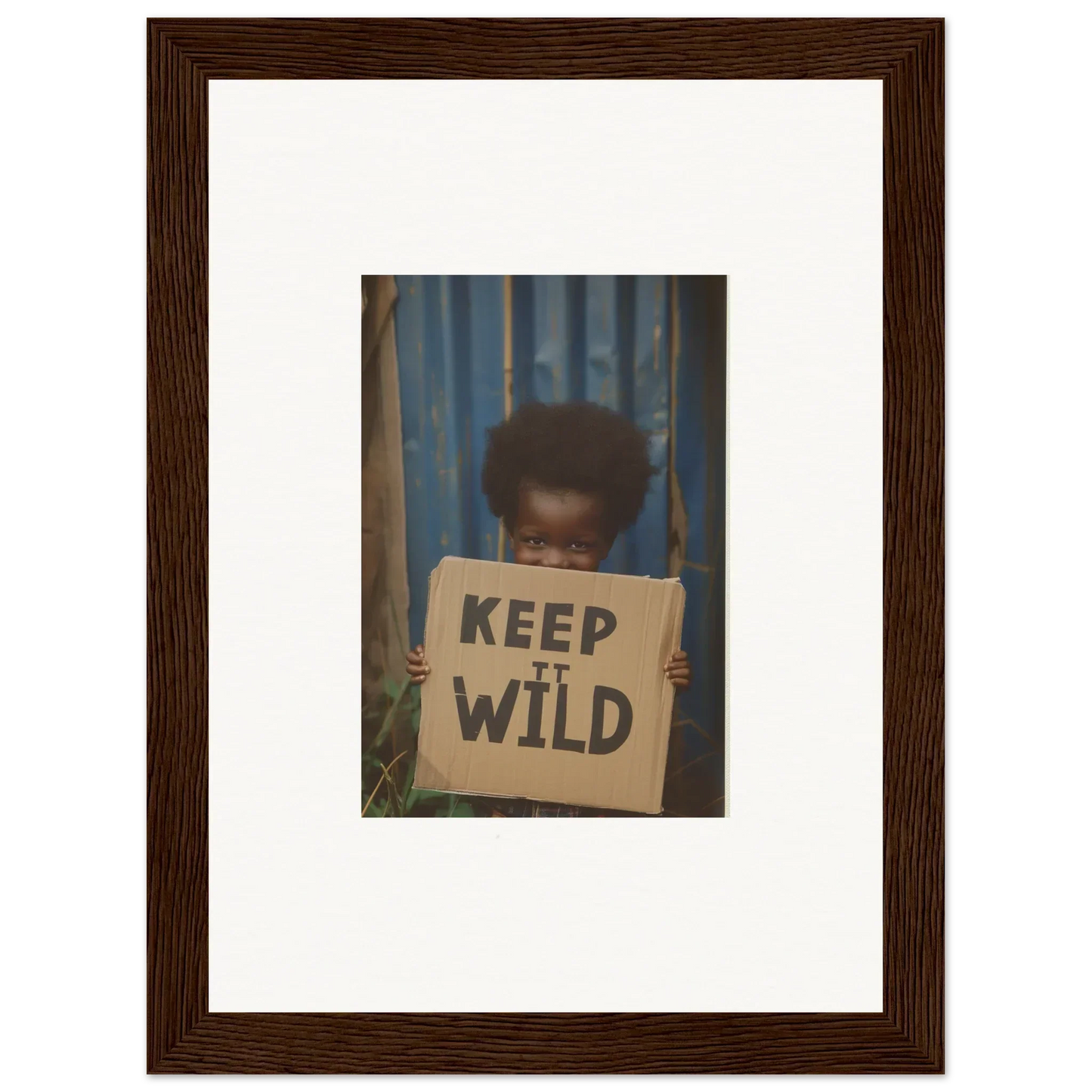 Framed photograph of a person with a KEEP IT WILD sign for room decoration, Wild Innocent Harmony