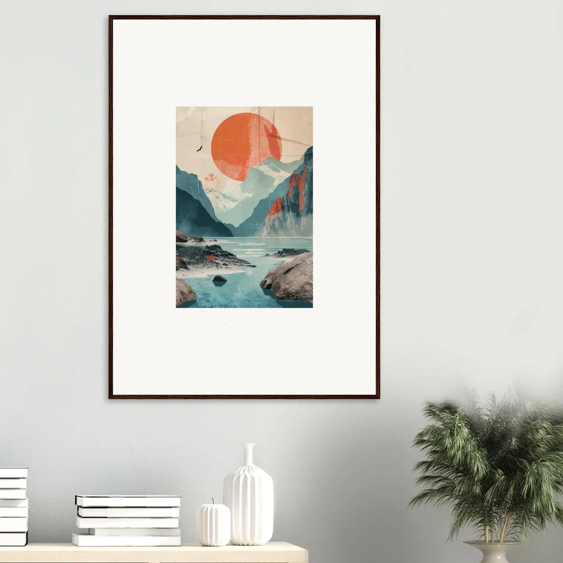 Framed wall art of a mountainous landscape with sun echoes and a waterfall for room decor