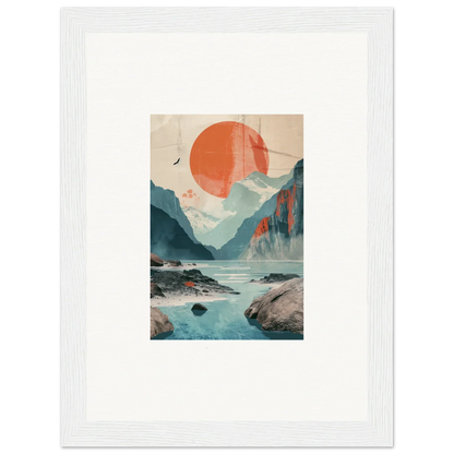 Framed wall art of a mountainous landscape with sun echoes and a vibrant orange sun