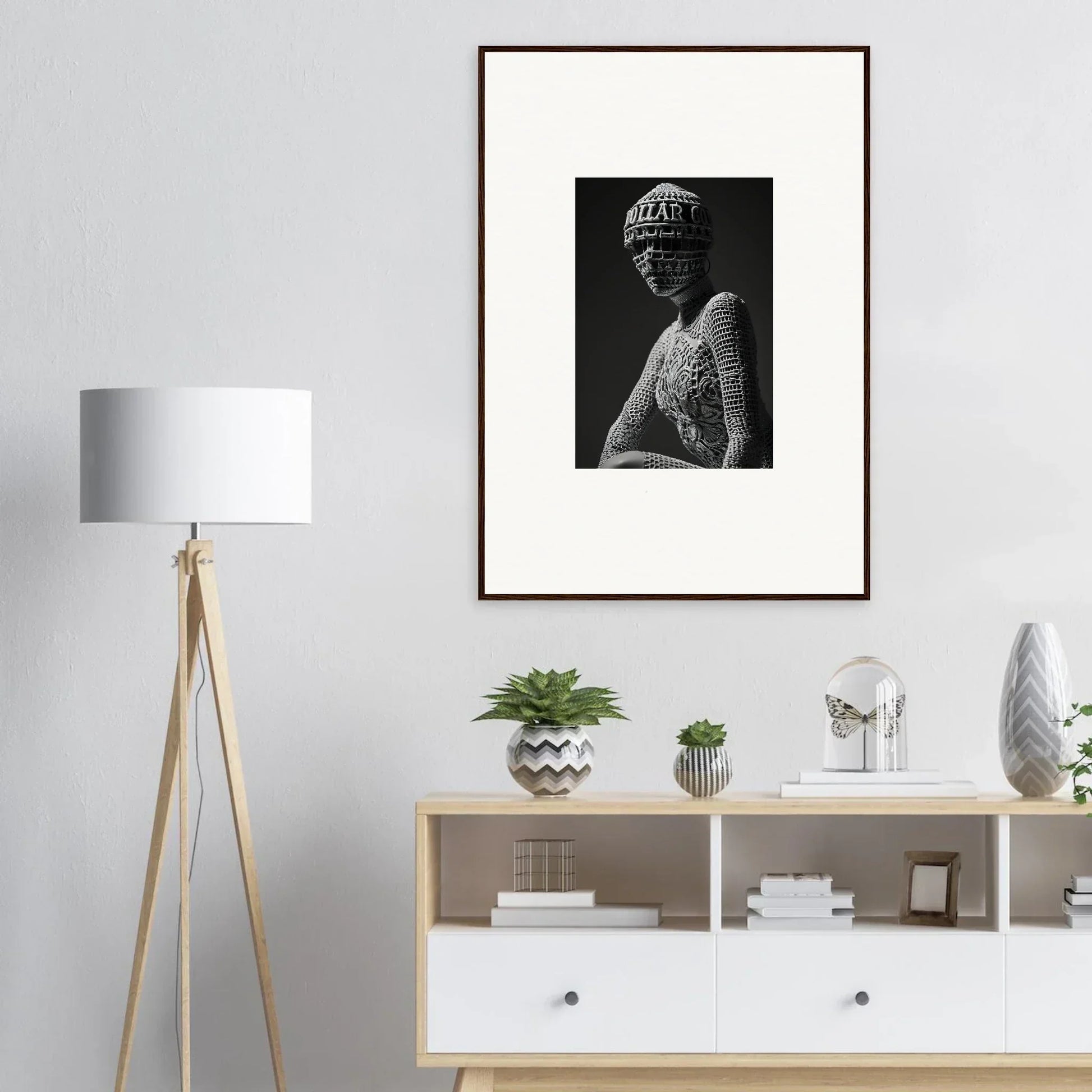 Framed black and white portrait of a person in a patterned headpiece for room decor