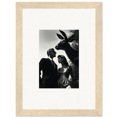 Framed black and white photograph of two people and a donkey.