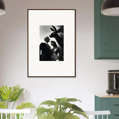 Framed black and white photograph of a couple standing close together under a palm tree.