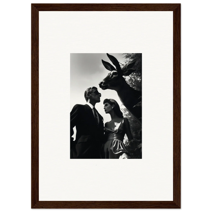 Framed black and white photograph of a couple with a donkey peering over their shoulders.