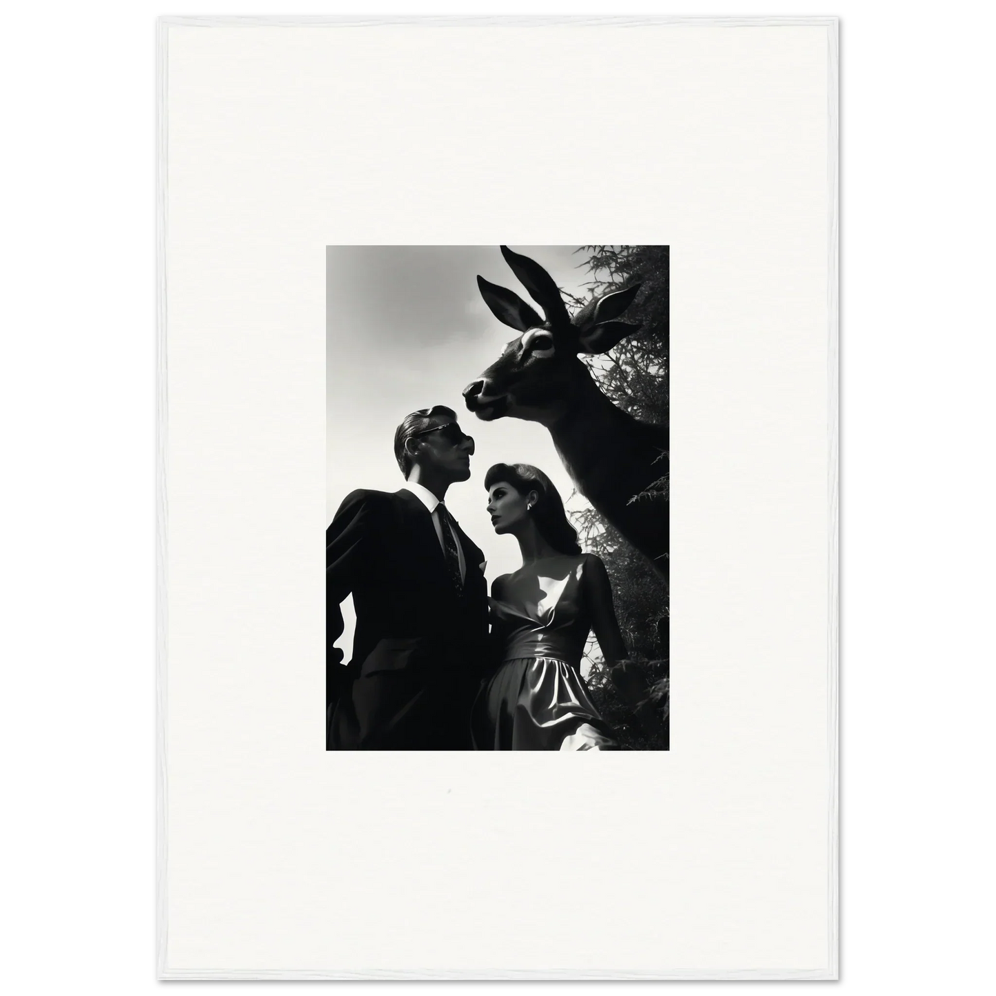 Black and white photograph of a couple with a large rabbit head looming above them.